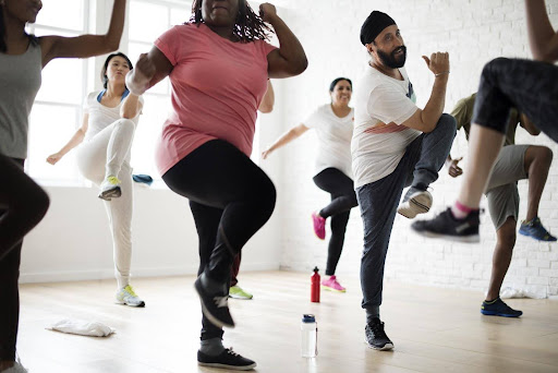 A group of people is exercising